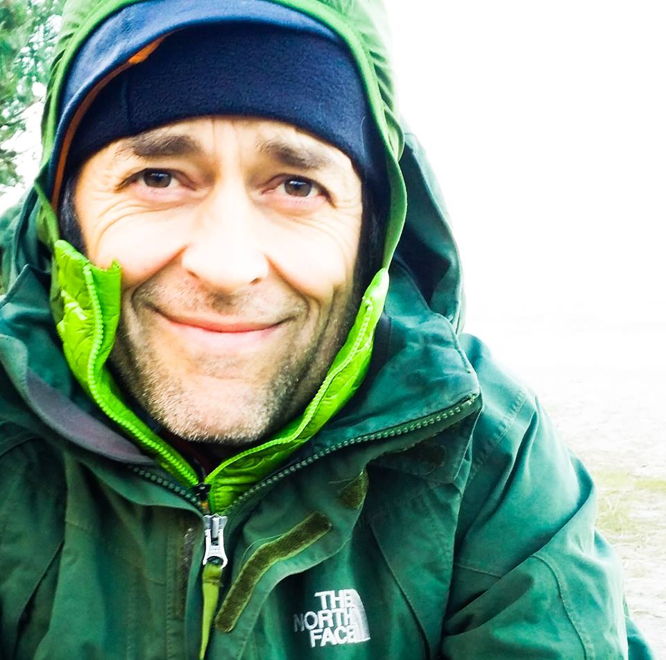 Portræt af Frits Ahlefeldt i grøn jakke.